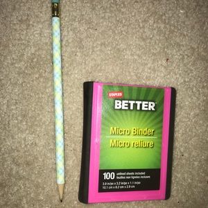 10 inch, pink binder with paper inside